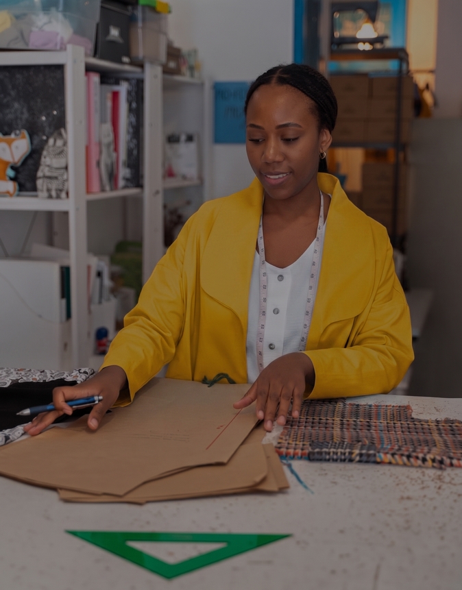 Business owner reviewing orders on a tablet
